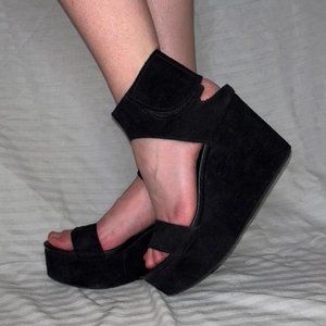 Black suede platform sandals by Pedro Garcia